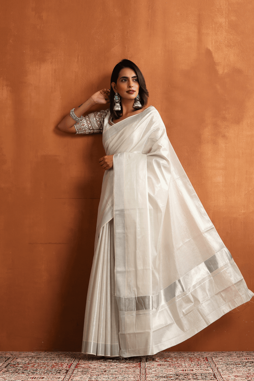 Ready to wear white Kasavu saree with silver border, pre-stitched pleats – Glamwiz