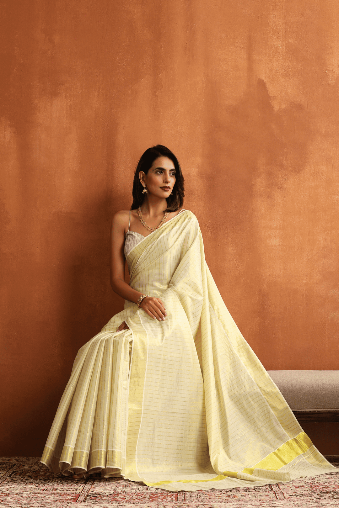 Ready to wear off white Kasavu saree with golden border, pre-stitched pleats – Glamwiz