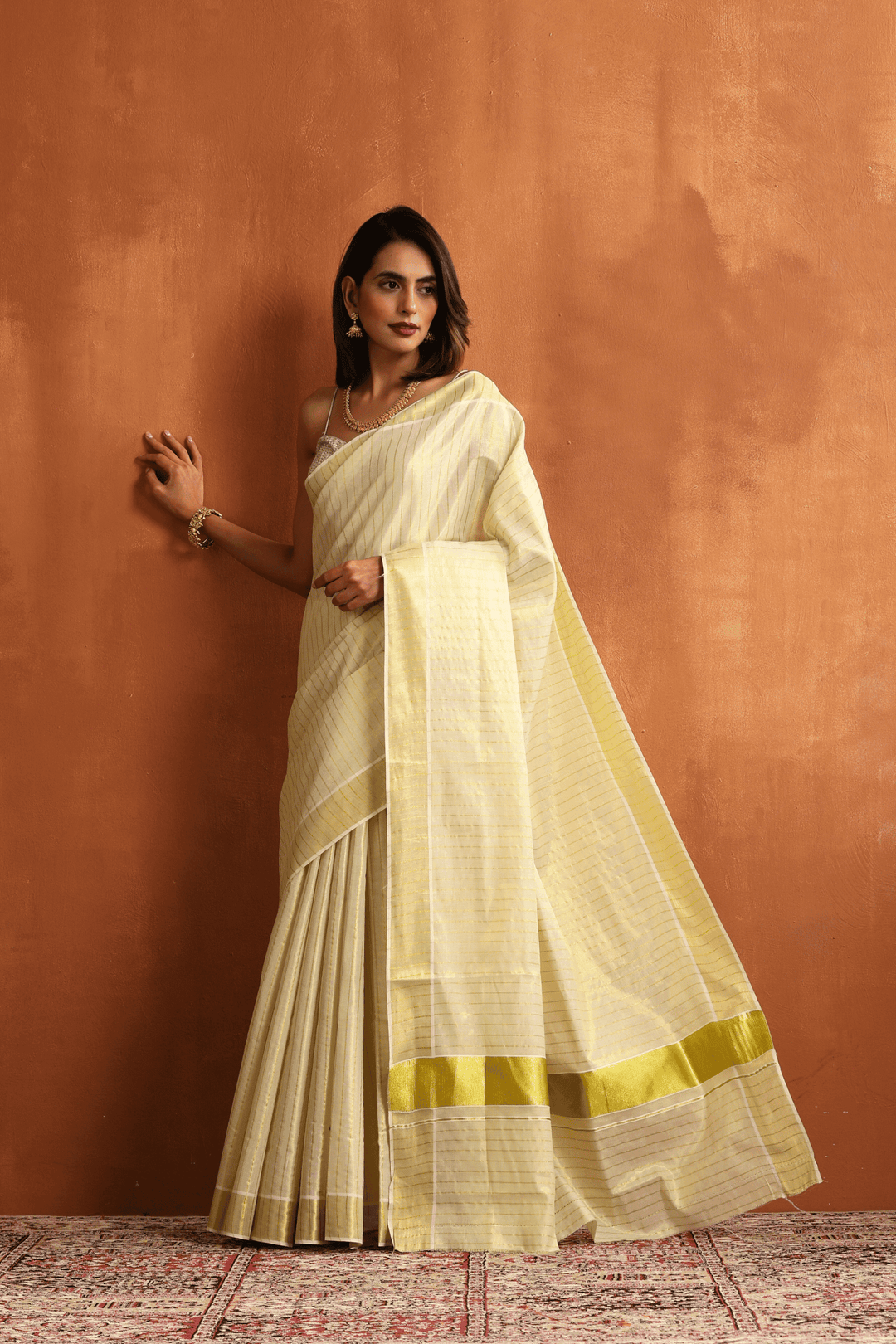 Ready to wear Kasavu saree with golden border, pre-stitched pleats – Glamwiz