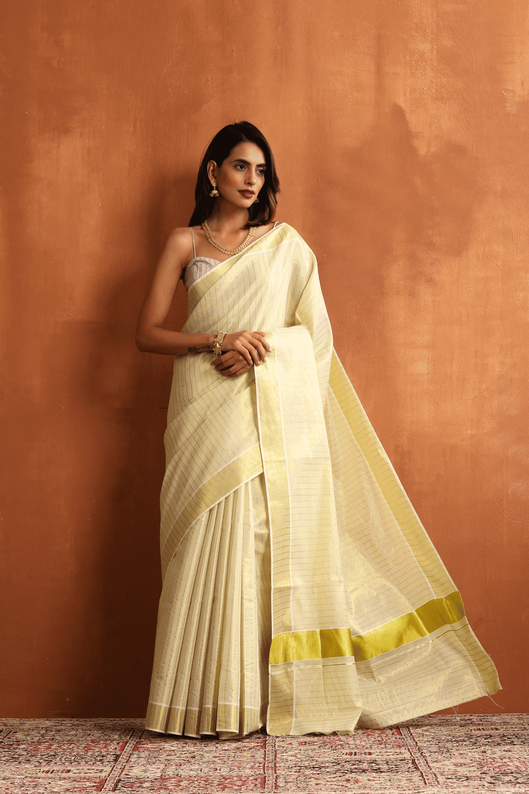 Ready to wear golden Kasavu saree with golden border, pre-stitched pleats – Glamwiz