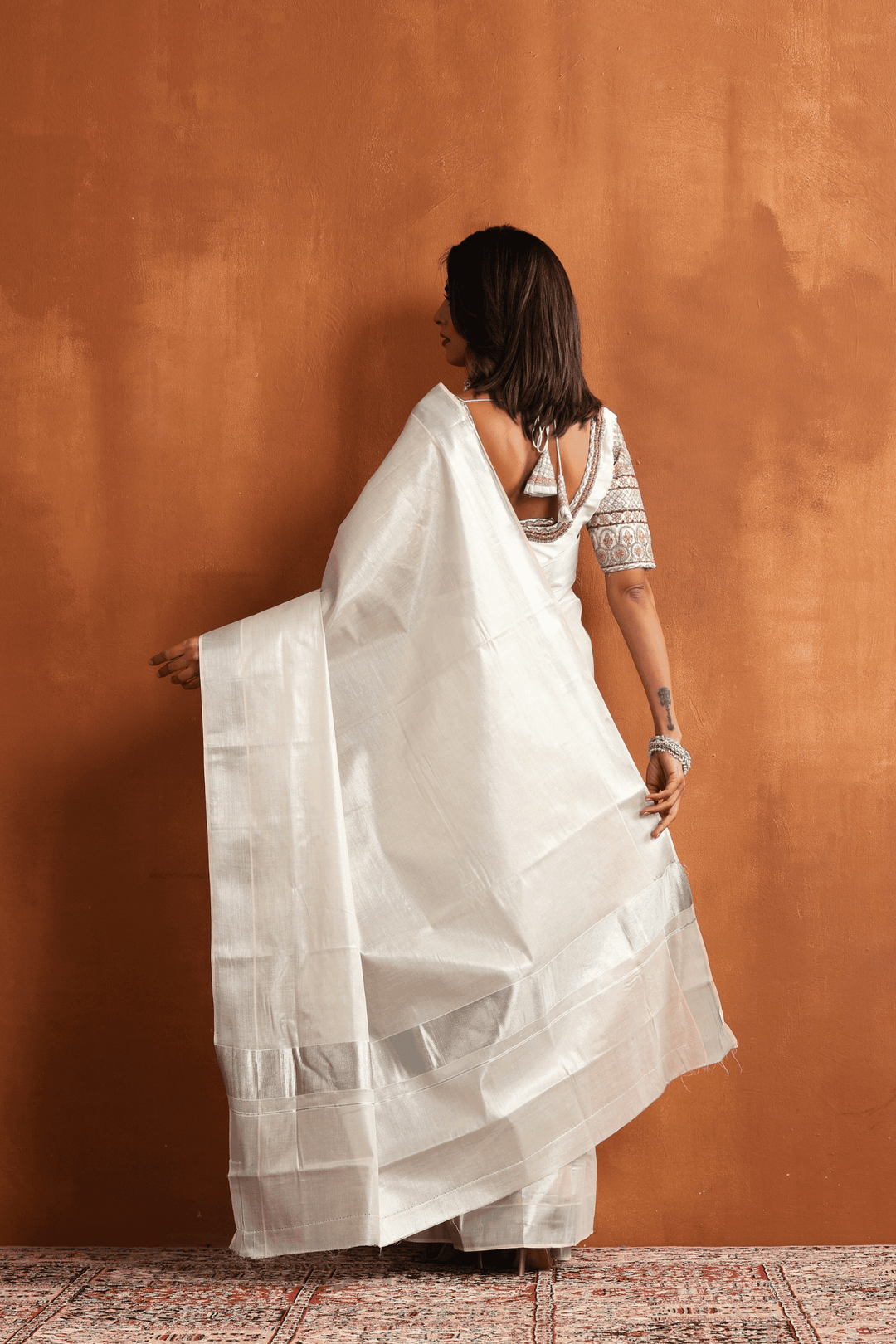 Ready to wear white Kasavu saree with silver border, pre-stitched pleats – Glamwiz