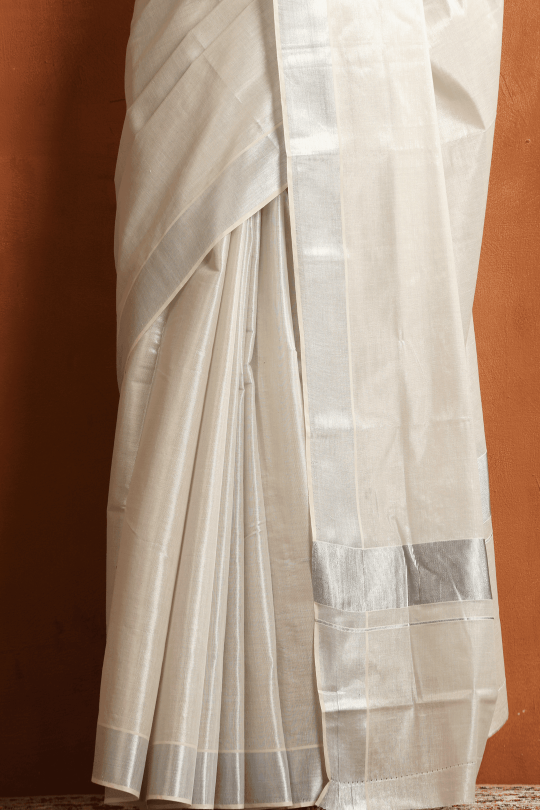 Ready to wear white Kasavu saree with silver border, pre-stitched pleats – Glamwiz